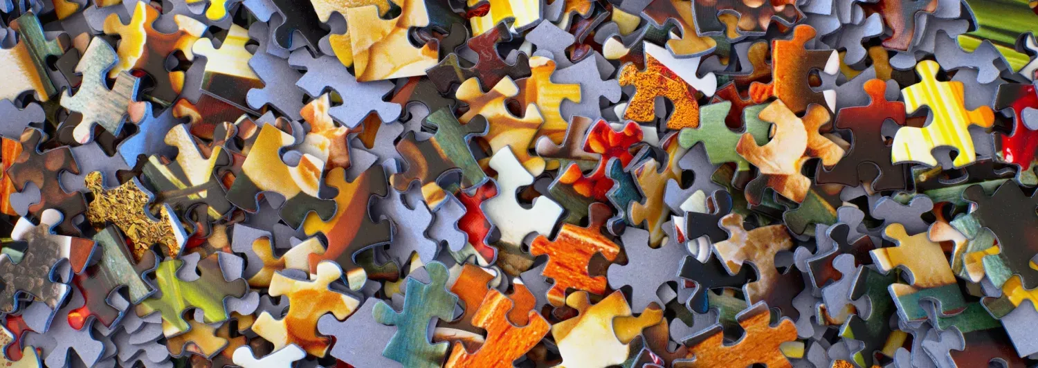 Puzzelstukjes - symbool voor samenwerking en inzicht in supervisie